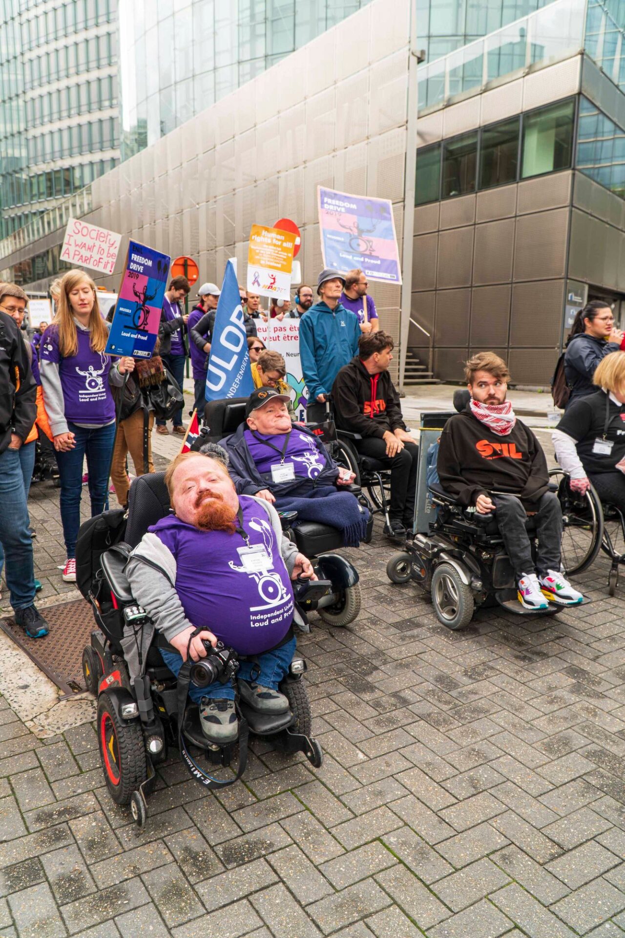 A group of people with banners during the Freedom Drive