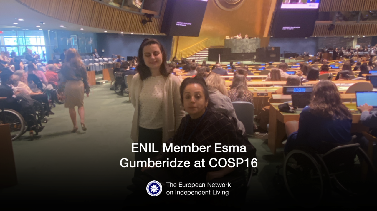 Nadia Hadad is sitting in her wheelchair with Esma beside her in a room at UN headquarters. Text says "ENIL Member Esma Gumberidze at COSP16"