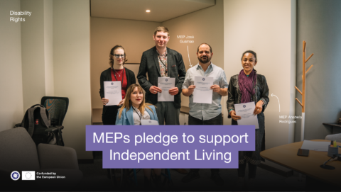MEPs pledge to support independent Living. Group photo of 3 ENIL staff members and two MEPs holding ENIL's manifesto