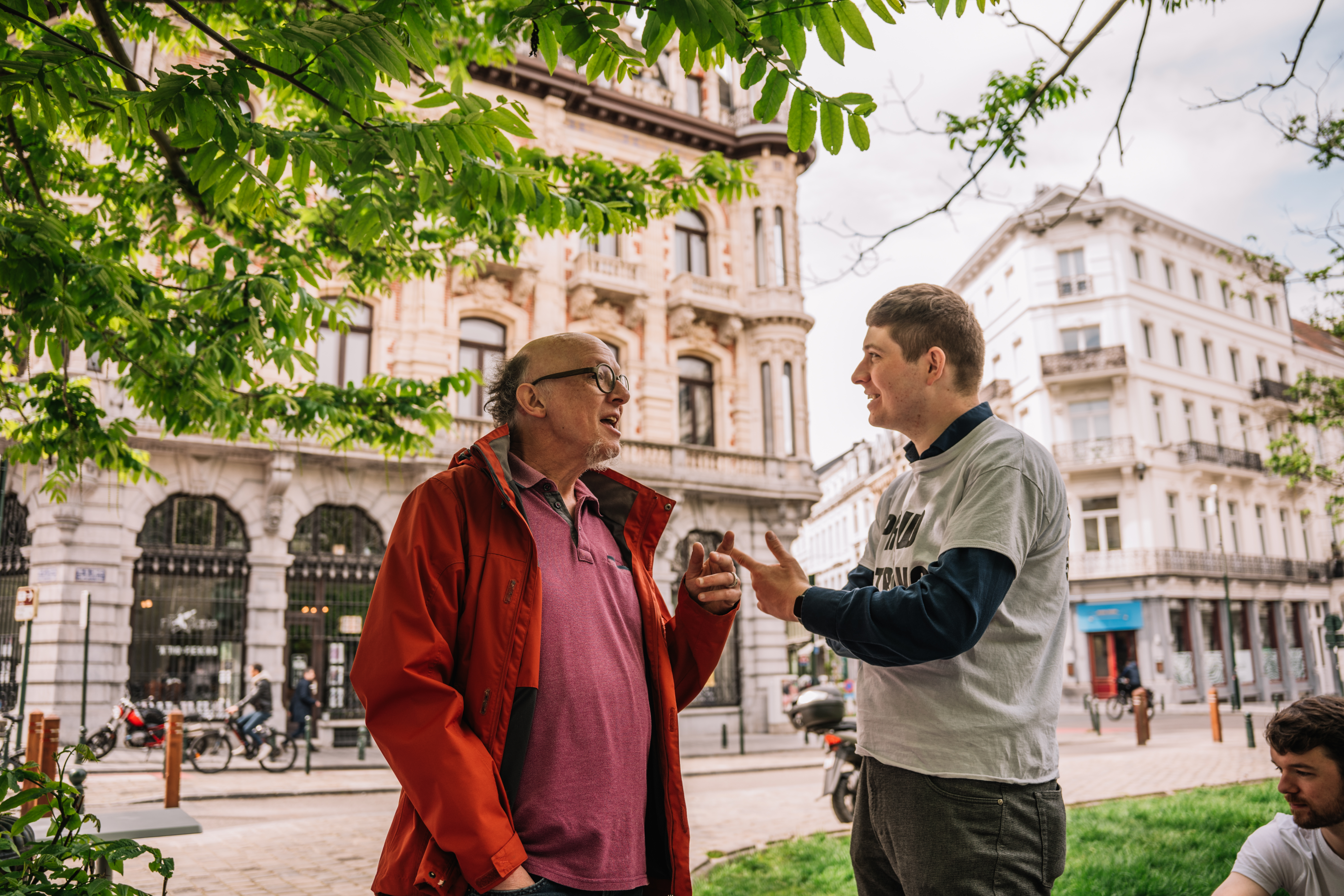 A person from ENIL and one from GRIP discussing.