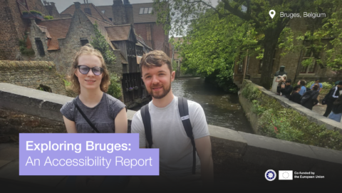 Text says "Exploring Bruges: an accessibility report". Photo of a woman and a man posing for a photo in the streets of Bruges. There is a river in the background.